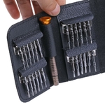 prise main pochette tournevis bien rangés