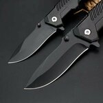 gros plan lames inox noirs couteaux tactique petit et grand