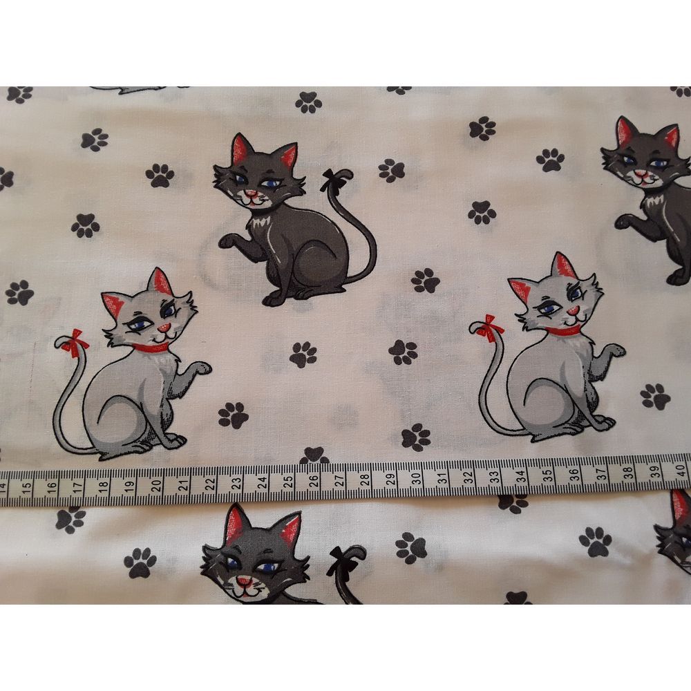 Tissu Motif Chat : Empreinte de pattes de chat - Fond noir