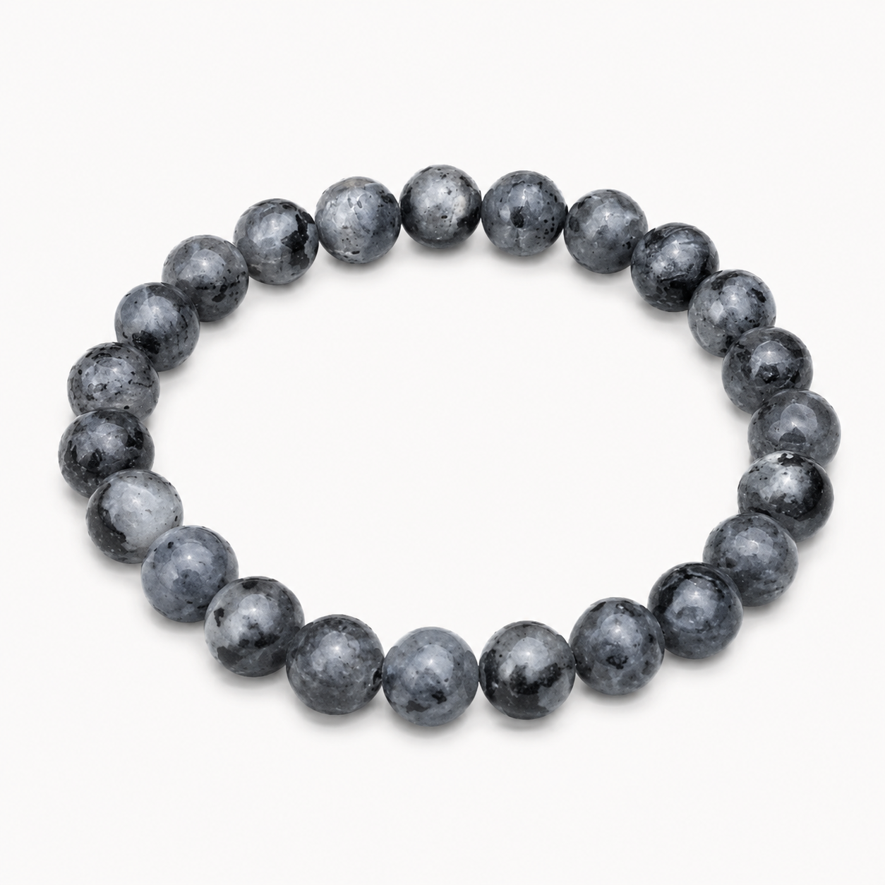 Bracelet Larvikite 8 mm détouré sur fond clair, perles rondes gris noir marbrées, clarté mentale et préservation énergétique.