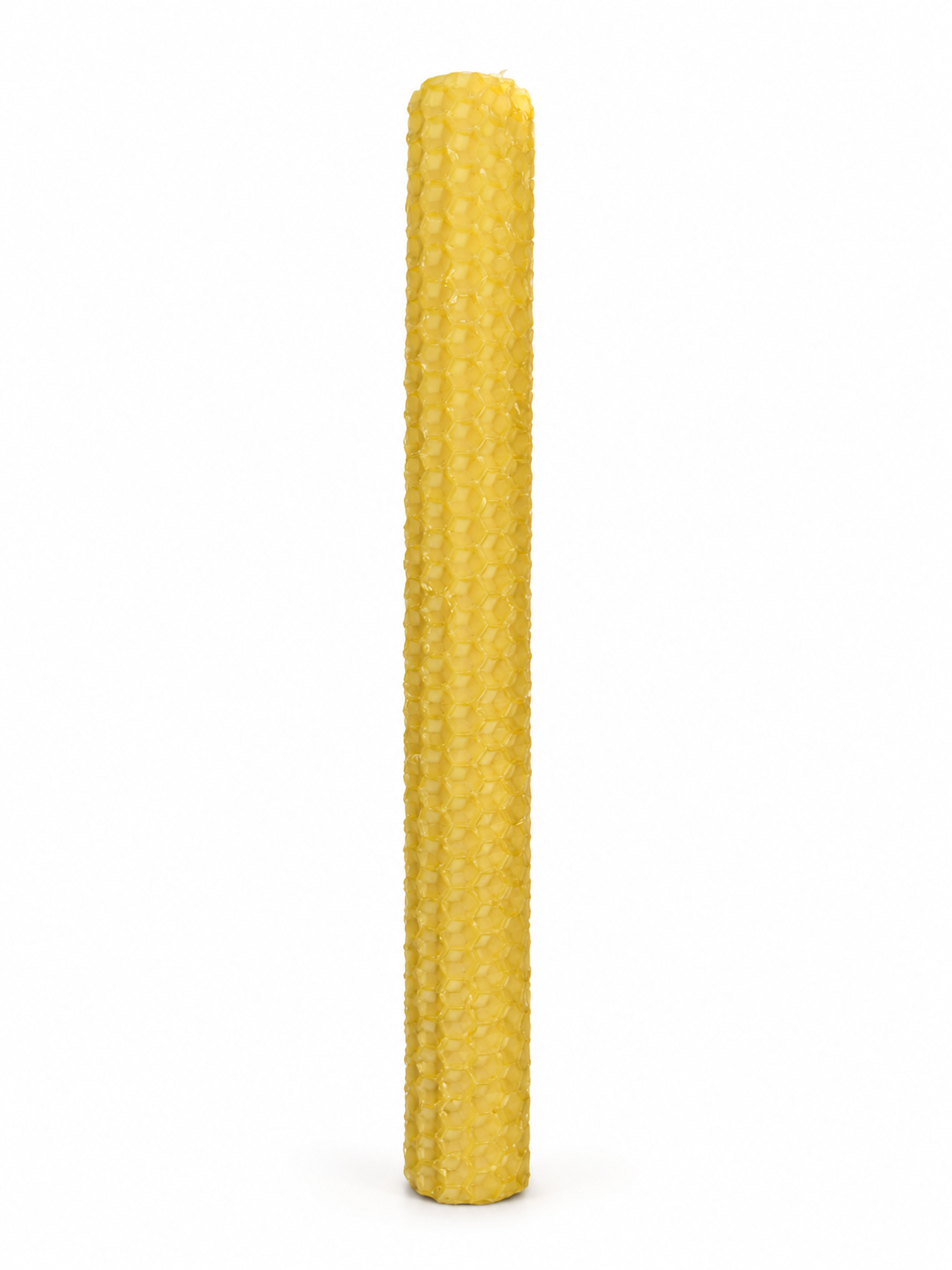 Bougie naturelle jaune sur fond blanc, texture alvéolée et bienfaits associés aux rituels et au recentrage