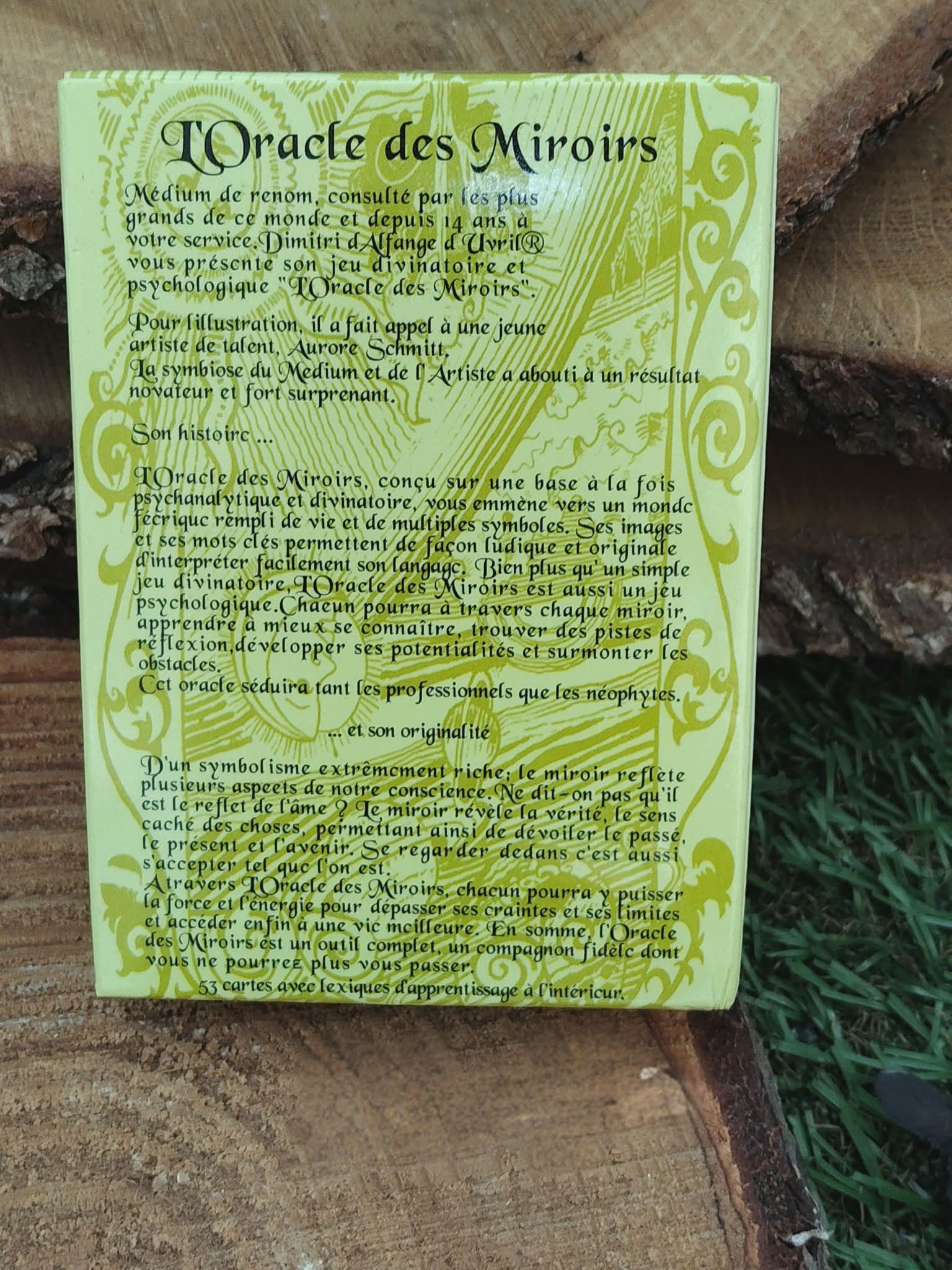 Oracle des miroirs Dimitri d’Alfange d’Uvril, dos de la boîte avec description du jeu et contenu, ambiance nature bois et mousse.