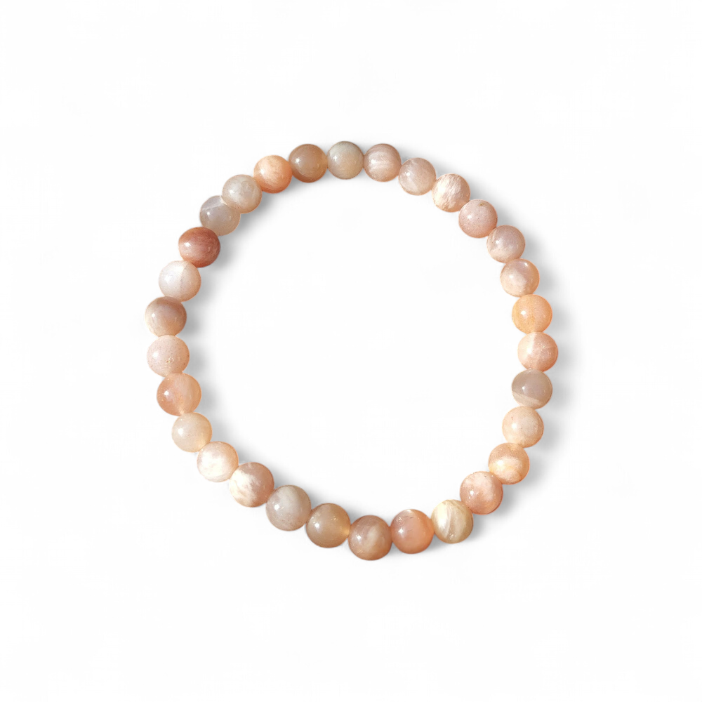 Bracelet pierre de soleil sur fond blanc, perles rondes 6 mm beige pêche pour motivation, énergie solaire et bonne humeur
