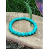 bracelet turquoise perles rondes sur coquillage et feuillage aide à apaiser la colère et à retrouver une énergie plus douce