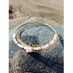 Bracelet semainier Love quartz rose et acier inoxydable doré sur galet, douceur du cœur et style raffiné