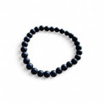 Bracelet shungite 6 mm sur fond blanc, perles noires polies en pierre naturelle pour recentrage, tenue émotionnelle et force tranquille