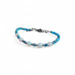 Bracelet création Magic Gaïa en apatite facettée et opale sur fond blanc, perles bleu turquoise et reflets irisés, expression de soi.