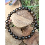Détail du bracelet en bronzite naturelle, perles polies avec éclats mordorés, bijou énergétique pour recentrage et lucidité.