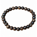 Bracelet bronzite détouré sur fond blanc, perles brunes brillantes aux reflets bronze, montage élastique simple et élégant.