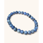 Bracelet Tanzanite 6-7 mm détouré sur fond clair, perles bleues polies aux inclusions naturelles, intuition, créativité et parole alignée.