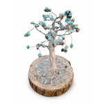 Arbre en Larimar baroque détouré sur fond blanc, création Magic Gaïa aux éclats bleu crème pour calme intérieur.