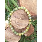 Bracelet serpentine en cercle sur champignons de bois, ancrage doux, stabilité et retour au calme