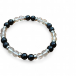Bracelet énergie négative sur fond blanc, shungite, tourmaline noire et cristal de roche pour recentrage, bouclier vibratoire et clarté intérieure