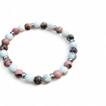 Bracelet déblocages émotionnels sur fond blanc, howlite et rhodonite pour stabilité émotionnelle, calme intérieur et douceur affective