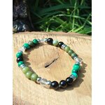 Bracelet Fibromyalgie en malachite verte, tourmaline noire et cristal de roche sur décor végétal, apaisement du stress et recentrage