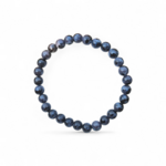 Bracelet Gabbro sombre aux reflets bleutés sur fond blanc, bracelet en pierre naturelle évoquant force intérieure et protection