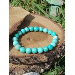 Bracelet turquoise du Pérou 8 mm sur tranche de bois en extérieur, perles bleu-vert pour énergie légère, calme du mental et respiration plus libre