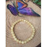 Bracelet calcite jaune sur bois brut avec décoration papillon, perles naturelles jaunes pour motivation, enthousiasme et confiance