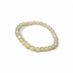 Bracelet calcite jaune sur fond blanc, perles polies 6 mm en pierre naturelle sur élastique, optimisme, lucidité et énergie lumineuse
