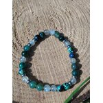 Bracelet azurite, labradorite et agate mousse sur bois texturé avec brin végétal, clarté mentale, recentrage et équilibre émotionnel