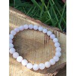 Bracelet kunzite 6 mm sur bois avec feuillage, perles rose dragée et lilas pâle pour détente nerveuse, souplesse du cœur et émotion plus légère