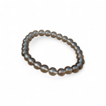 Bracelet obsidienne larme d’Apache sur fond blanc, perles noires 6 mm pour recentrage, stabilité intérieure et apaisement du ressenti