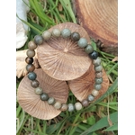 Bracelet jaspe feuilles dargent 6 mm sur rondelles de bois clair avec feuillage,perles vert mousse, brun taupe, beige minéral et perles foncées , apaisement, expression posée et souplesse émotionnelle