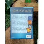 Dos du coffret « Le Tarot Psychique » (John Holland) : résumé au dos, visuel de cartes, boîte bleue posée sur rondin de bois