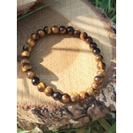 Bracelet Œil de Tigre 6 mm sur élastique, perles brun doré, décor écorce et verdure, lucidité et maîtrise de soi.