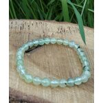 Bracelet préhnite 6 mm sur rondin de bois avec feuillage vert, perles vert d’eau translucides pour sérénité intérieure, discernement et calme du mental