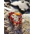 Bracelet bébé en ambre naturel sur rochers en Bretagne près de l’eau, perles miel cognac et fermoir de sécurité, bijou doux et lumineux