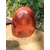 Forme libre Cornaline naturelle sur bois, pierre orange-rouge pour la lithothérapie – vitalité, créativité, confiance en soi, chakra sacré
