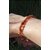 Bracelet ambre naturel couleur miel porté au poignet, perles chaudes et lumineuses pour réconfort intérieur, douceur et énergie solaire