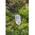 Porte-clés / bijou de sac en cristal de roche taillé en pointe facettée, posé sur mousse verte en décor forêt, ambiance nature féerique – Magic Gaïa