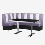 angle de salle à manger avec banquettes vinyle mauve et table rétro