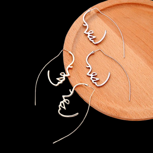 abstrait-visage-boucles-doreilles-coule_description-20-removebg-preview