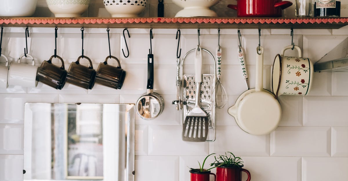 cozy kitchen shelf with hanging utensils colorful bowls and rustic decor creating a warm atmosphere