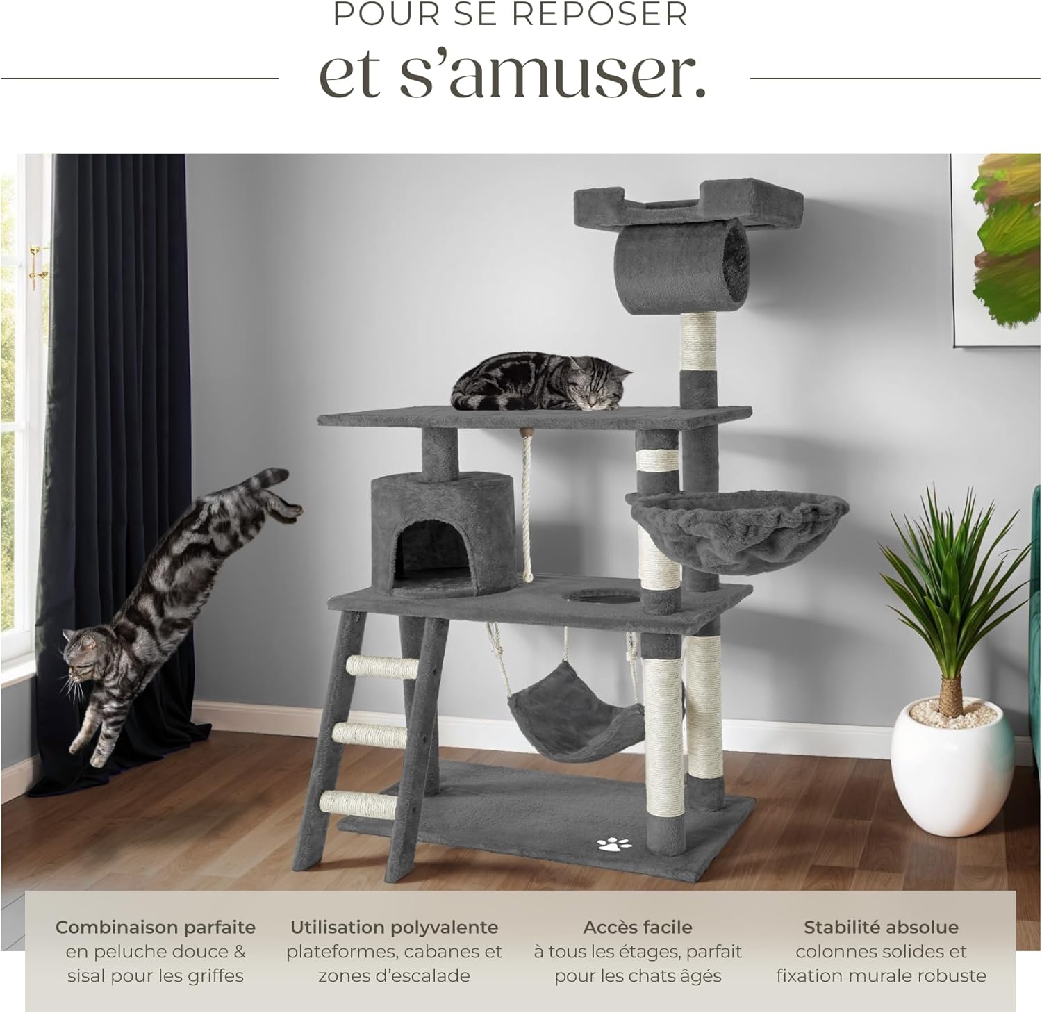 Chat couché dans la niche douillette de l’arbre à chat TecTake doté de plateformes griffoir en sisal.