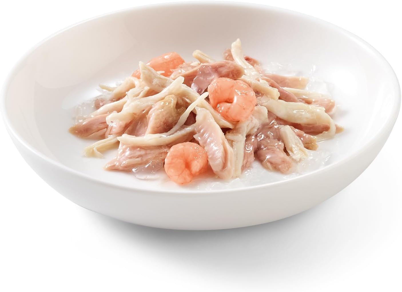 Zoom sur une portion de gelée avec thon, poulet et crevettes dans une gamelle.