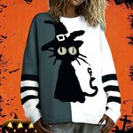 femme portant un pull d’Halloween au motif chat effrayant