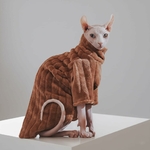 sphinx en manteau festif design raffiné