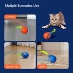Jouet interactif premium balle chat design raffiné avec queue plume orange.