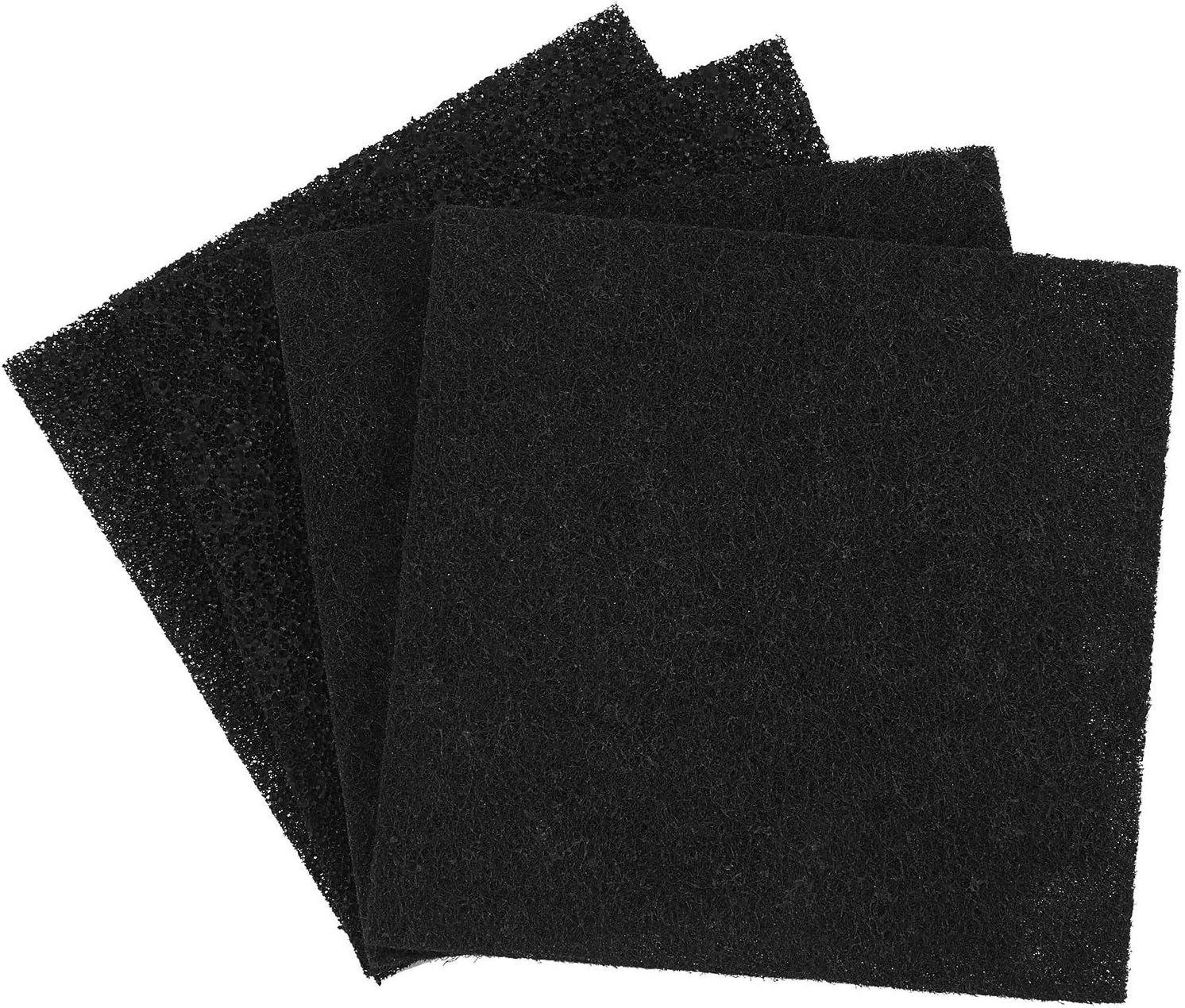 Quatre filtres à charbon noirs en mousse poreuse, posés en éventail