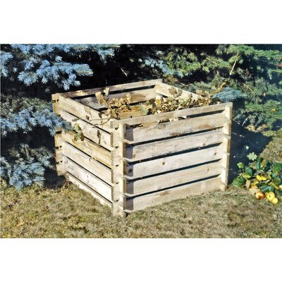 Composteur en bois en kit Tiktaktoo 100 x 100 cm rempli de feuilles, posé dans l'herbe