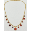 Collier Ravello : Ornements facettés ronds, carrés et en goutte, accompagnés de petites perles