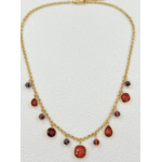 Collier Ravello : Ornements facettés ronds, carrés et en goutte, accompagnés de petites perles