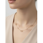 Collier Milano : Trois motifs ovales ajourés traversés d’une barrette et détails brillants