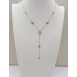 Collier cravate Como : Motifs ovales ajourés, centre brillant et chaîne pendante à deux ovales
