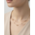 Collier Milano : Trois motifs ovales ajourés traversés d’une barrette et détails brillants