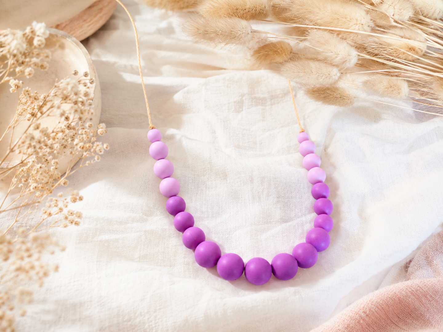 Collier femme silicone orchidée perles rondes